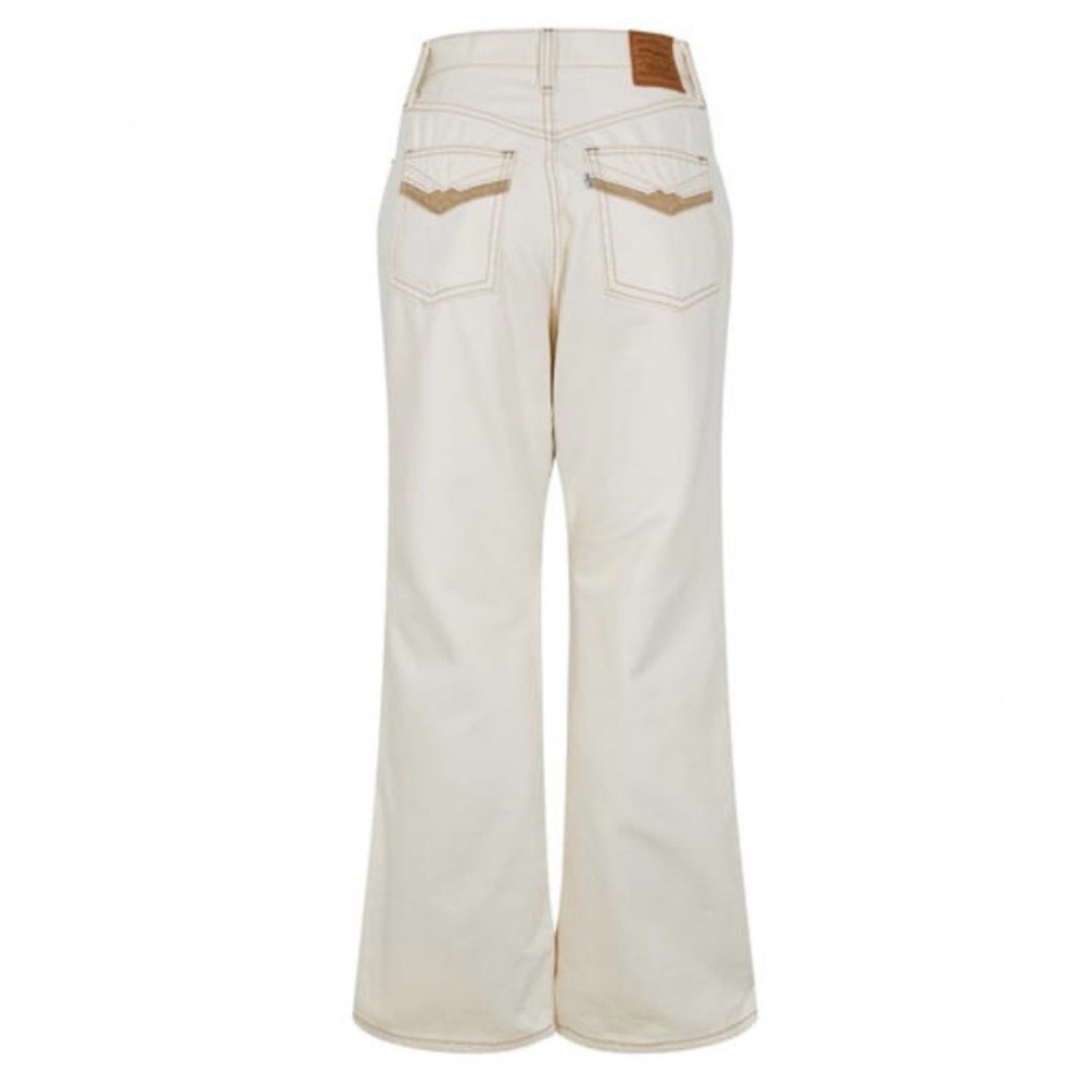 Levi’s Premium 70s Movin’ On High Rise Flare Jeans in Sunny Cream - Picture 3 of 15